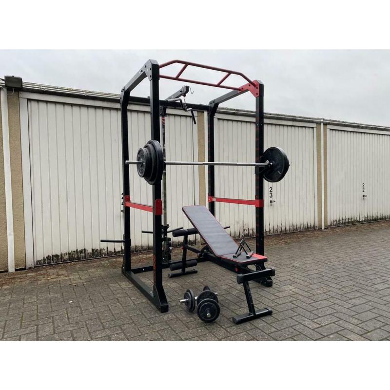 120kg + Powerrack en verstelbaar bankje + dumbells