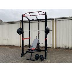 120kg + Powerrack en verstelbaar bankje + dumbells