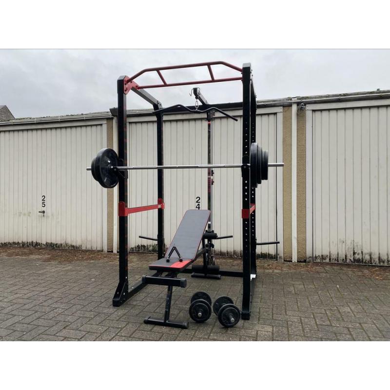 120kg + Powerrack en verstelbaar bankje + dumbells