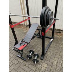 120kg + Powerrack en verstelbaar bankje + dumbells
