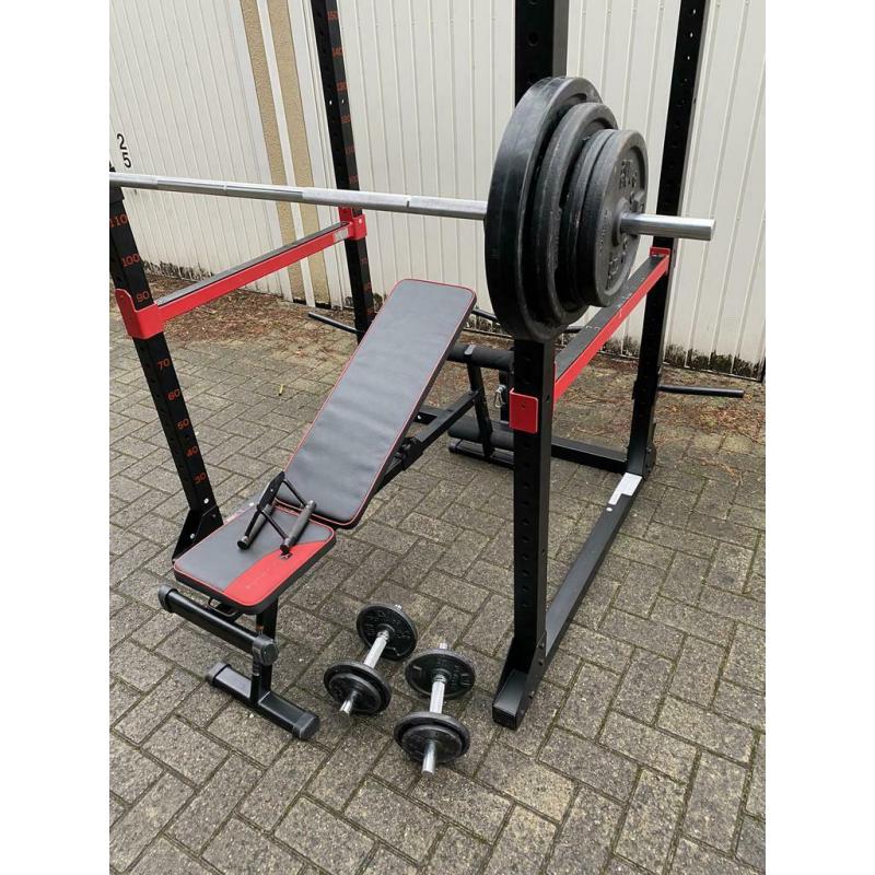 120kg + Powerrack en verstelbaar bankje + dumbells